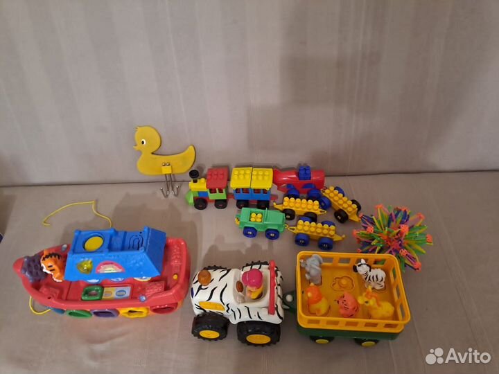 Игрушки пазлы книжки