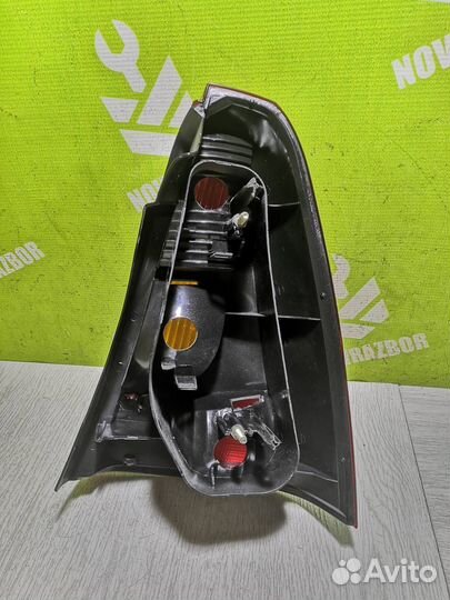 Фонарь задний левый Рено Логан