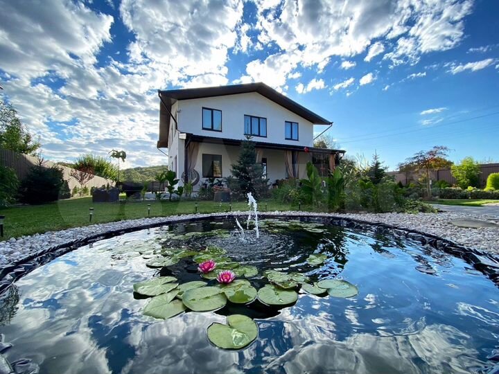 Дом 311 м² на участке 14 сот.