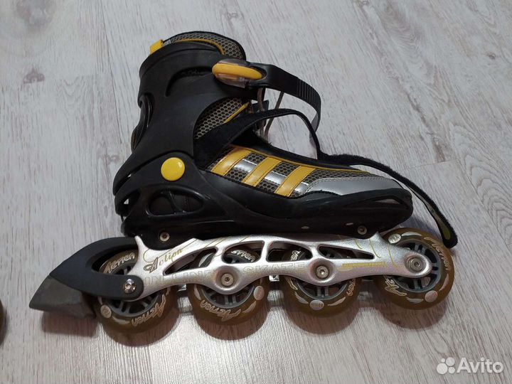 Роликовые коньки