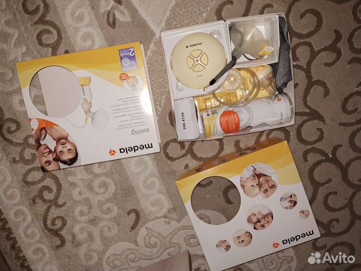 Электрический молокоотсос medela