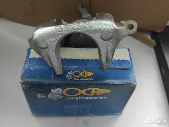 Суппорт тормозной задний правый Dodge Journey