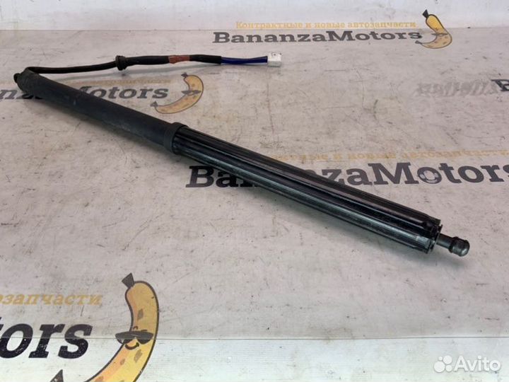 Амортизатор двери багажника задний левый Lexus