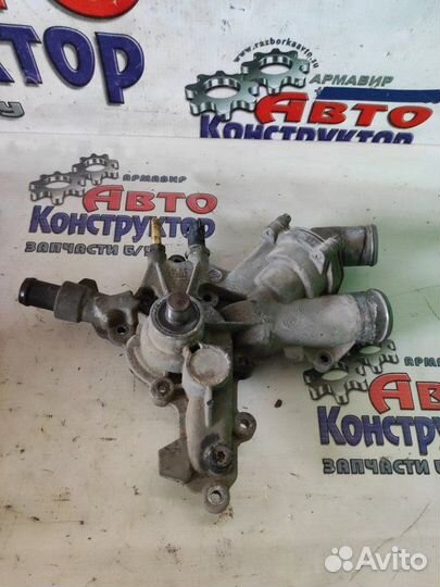 Корпус термостата Opel Corsa D купе Z10XEP 2008