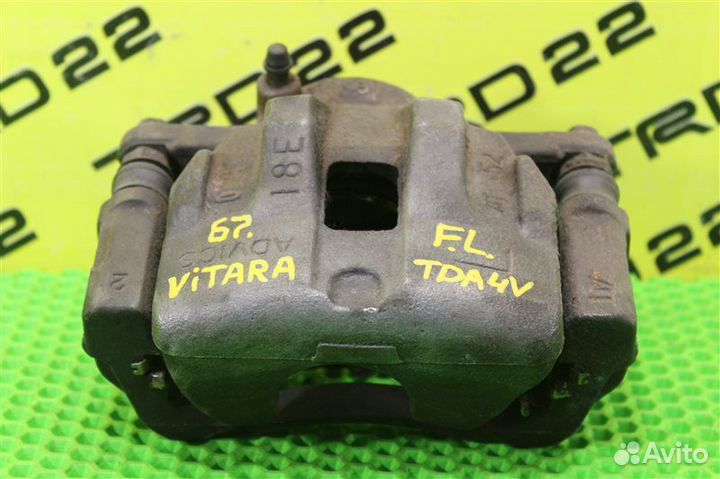 Суппорт тормозной передний левый Suzuki Grand