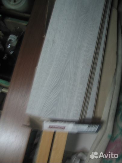 Обналичка,Ламинат в остат цвета белый,коричневый