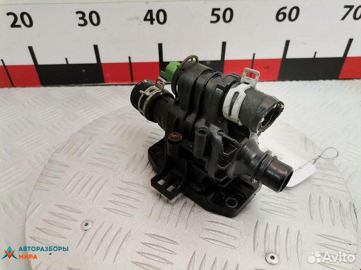 Корпус термостата Ford Fiesta 5 рест. 2009