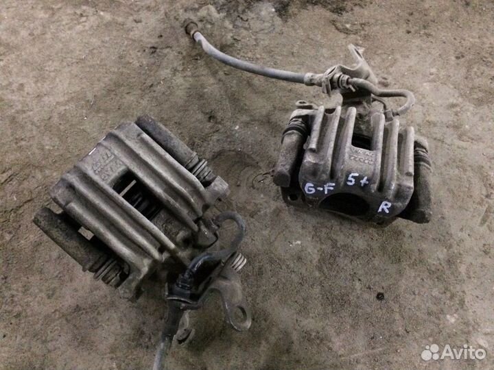 Суппорт тормозной Фольцваген Гольф 5 плюс