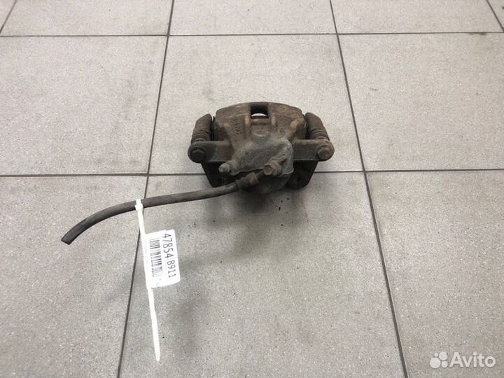 Суппорт тормозной передний левый Nissan Note