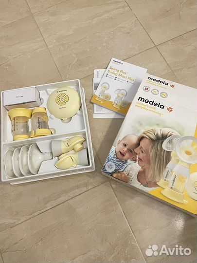 Молокоотсос medela swing maxi flex