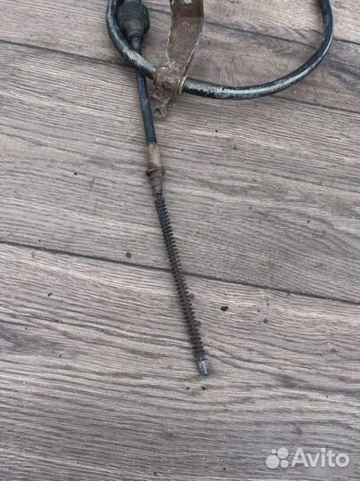 Трос ручного тормоза Mitsubishi Lancer 1.6
