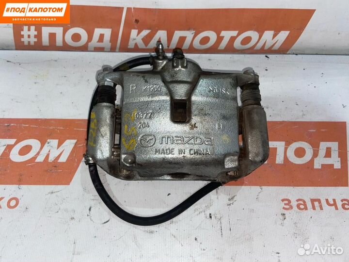 Суппорт тормозной передний правый Mazda 3 BM рест