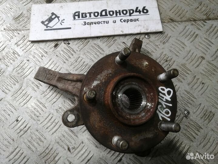 Кулак передний левый Mitsubishi Lancer X