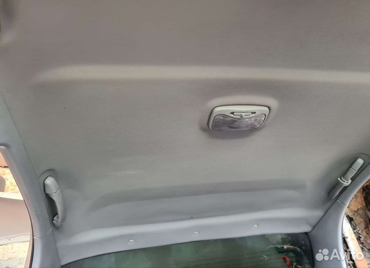 Обшивка потолка (потолок) Kia Spectra