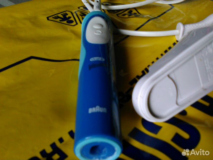 Зубная электрощетка