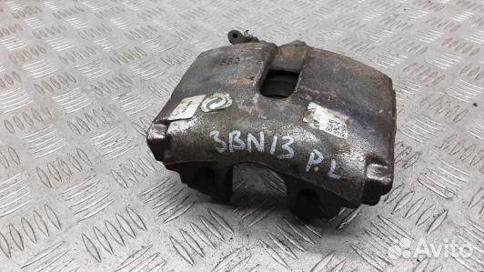 Суппорт тормозной передний левый volkswagen passat