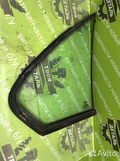 Стекло двери форточка левая Bmw E34