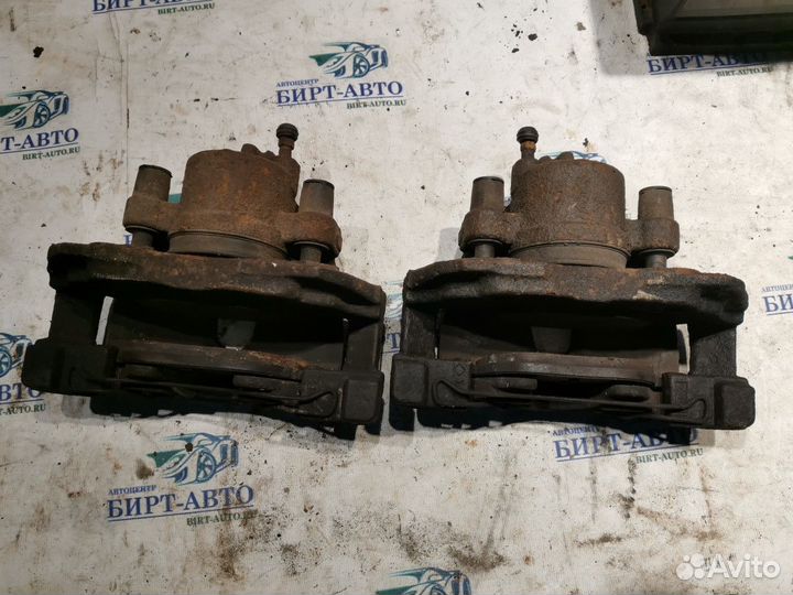 Суппорт тормозной передний Ford Focus III (2011—20