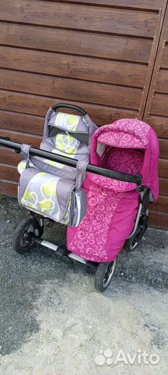 Двойная детская коляска