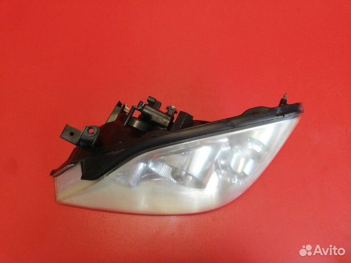 Фара левая Nissan Primera