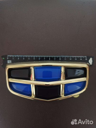 Эмблема решетки радиатора Geely Atlas NL-3