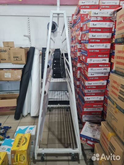 Стойка для рулонов клеенки