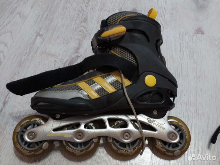 Роликовые коньки