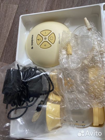 Молокоосос medela swing maxi flex
