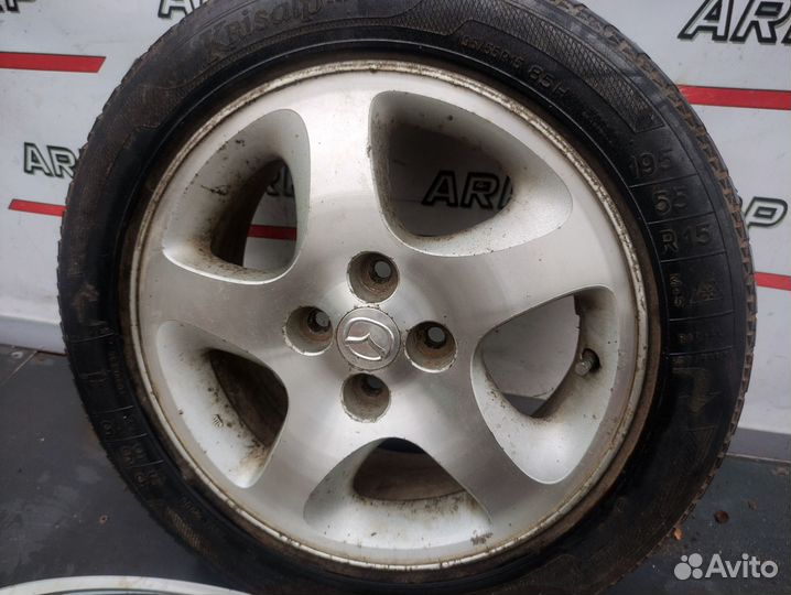 Колесо на литом диске R15 6 et45 4x100 185/65