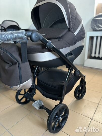 Tutis Nanni коричневая и черная Коляска с рождения