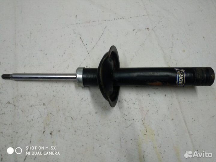 Амортизатор передний левый Peugeot 306 7E DW10TD