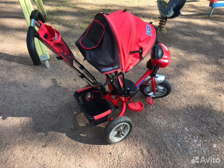 Трехколесный велосипед с ручкой