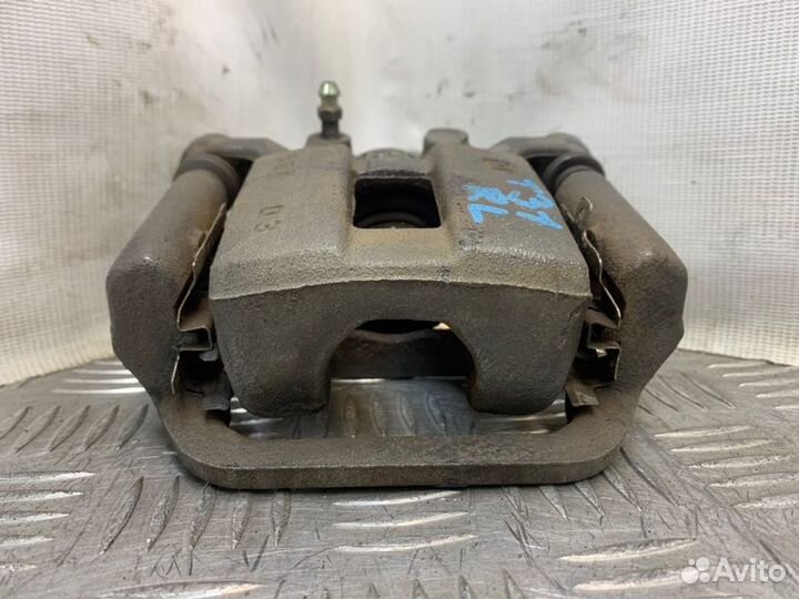 Суппорт тормозной задний левый Nissan X-Trail T31