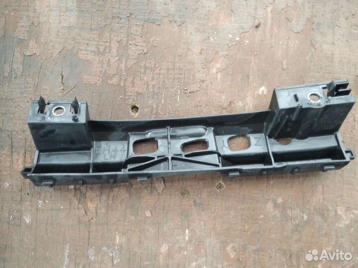 Mazda cx7 кронштейн фары левый