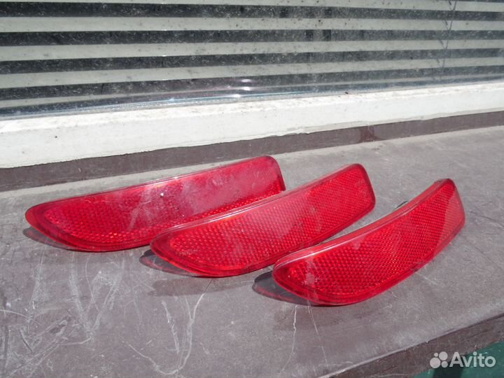 Отражатель заднего бампера правый Рено Логан 1