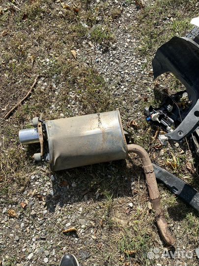 Глушитель на камри левая сторона на 50 55 кузов