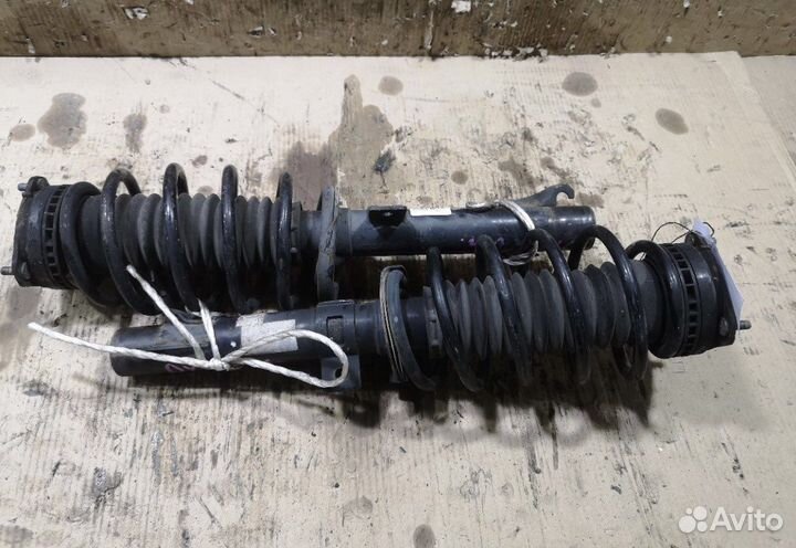 Стойки передние mazda 2 2008 год