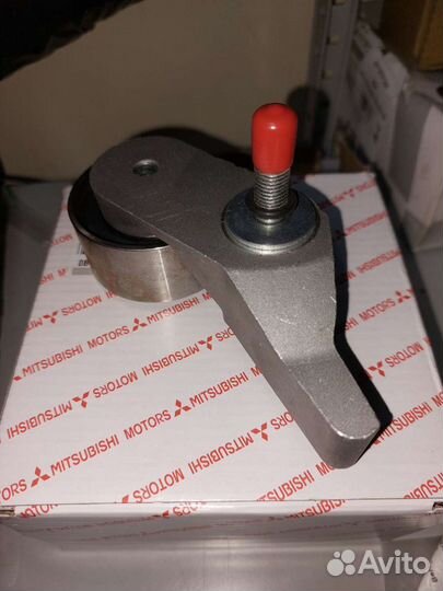 Натяжитель ремня грм В сборе