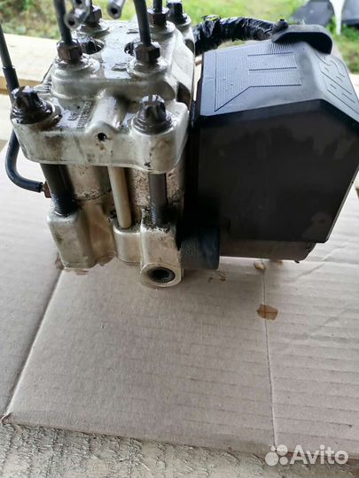 Блок ABS Nissan Primera P10