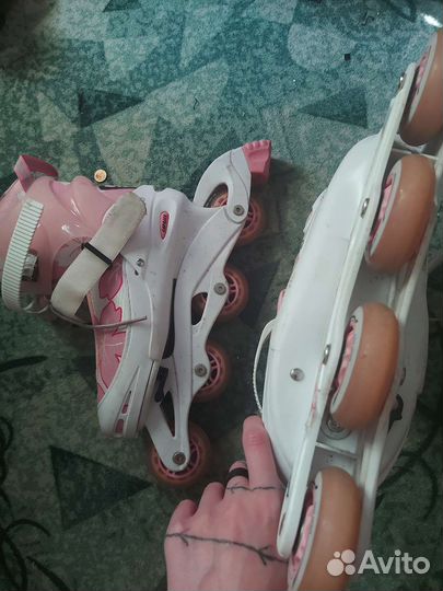 Роликовые коньки