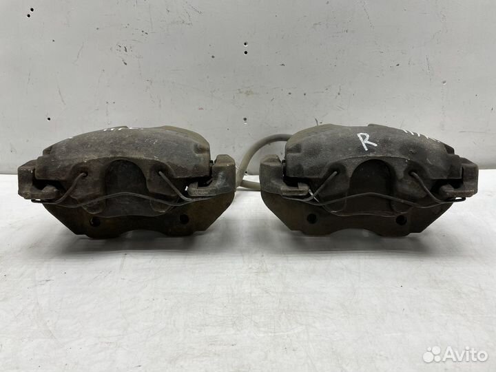 Суппорт передний левый / правый Mazda 3 BL 1.6