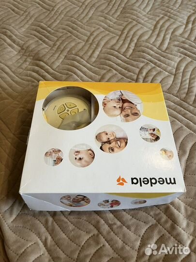 Молокоотсос электрический medela