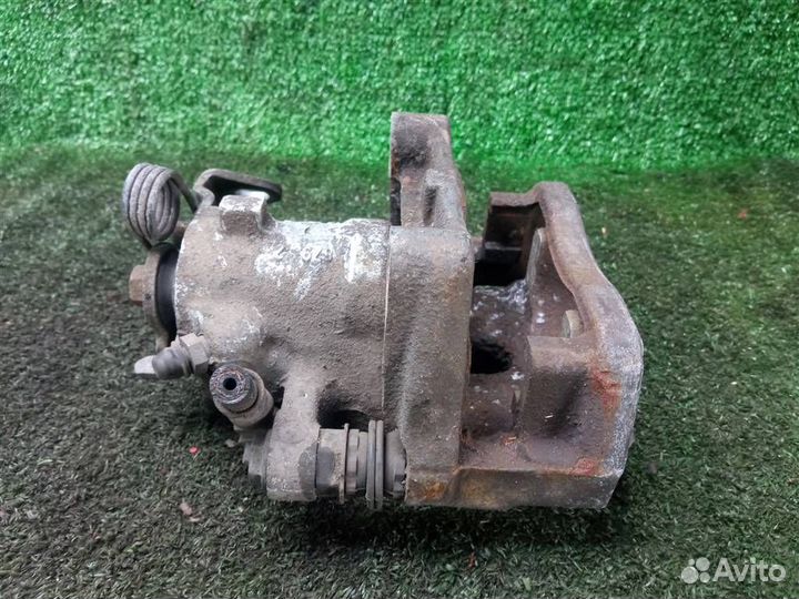 Суппорт задний правый Opel Astra H (2004-2014)