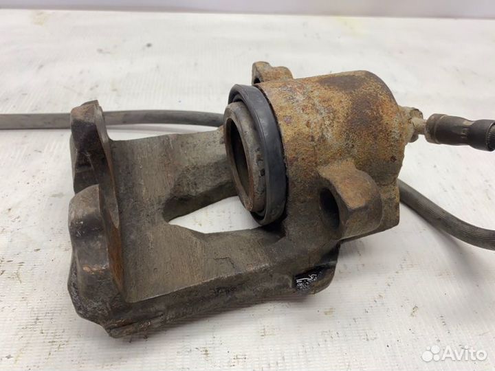 Суппорт тормозной передний левый Skoda Octavia A5