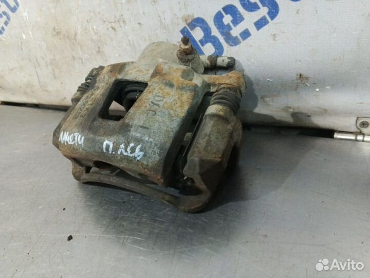 Суппорт тормозной передний левый Chevrolet Lacetti