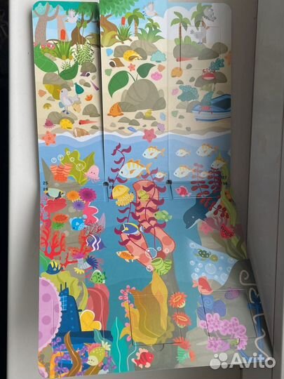 В море Книжка детская с клапанами clever