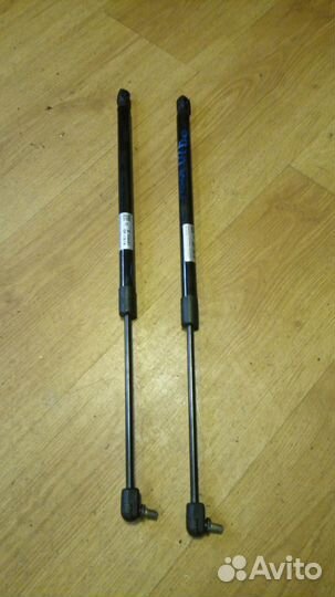 Амортизаторы крышки багажника Рено сценик 2