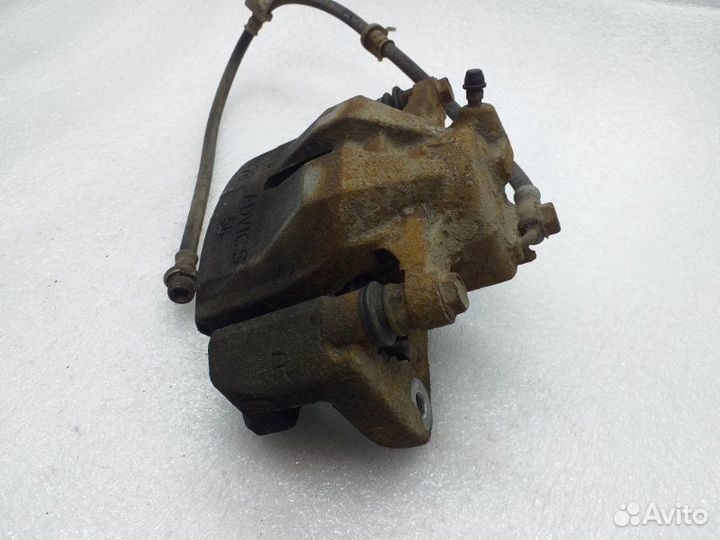 Суппорт тормозной передний правый Toyota Rav4 XA40