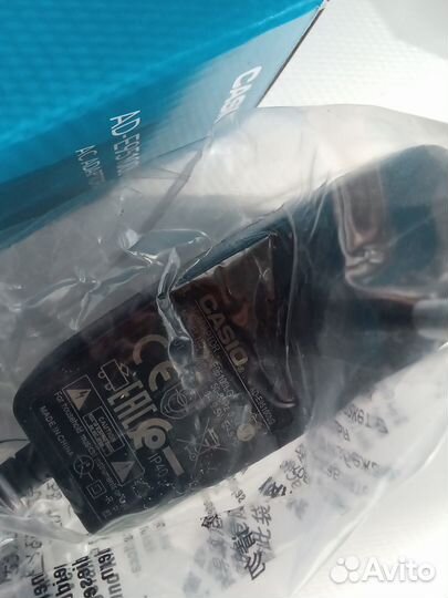 Блок питания Casio 9.5V 1A AD-E95100L новый ориг