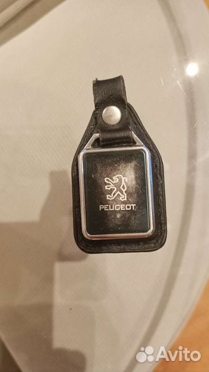 Брелок оригинал из натуральной кожи к авто Пежо